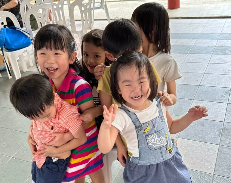 Children playing as part of their class